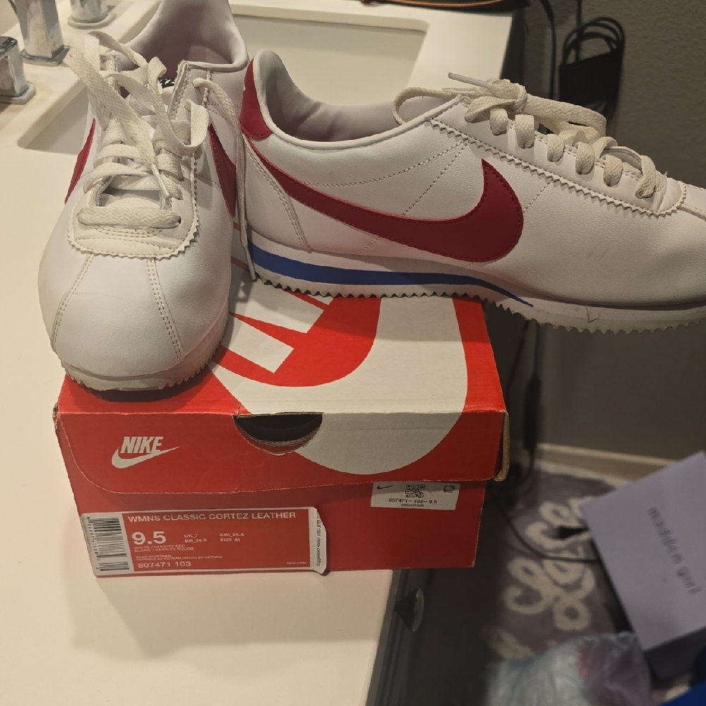 Nike White Leather Cortez Sneakers with Red Swoosh and Blue Stripe